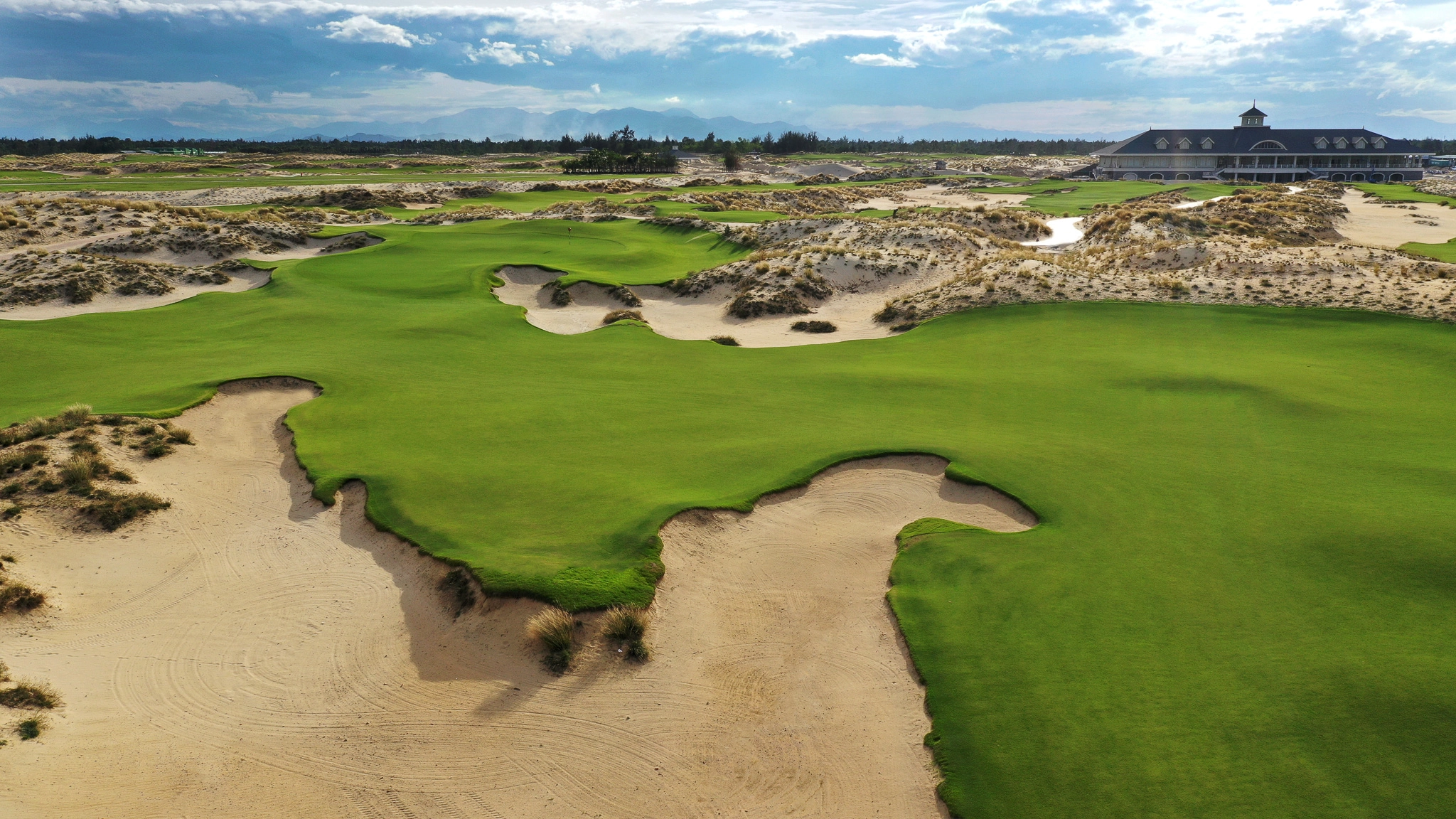 Hoiana Shores Golf Club — ocean-side fairway with natural dune landscape at golden hour